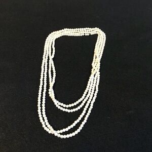 2 strands of faux pearls